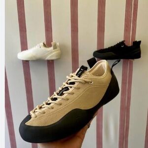 Village PM Beige and black sneaker size 6.5 men’s 8 women.